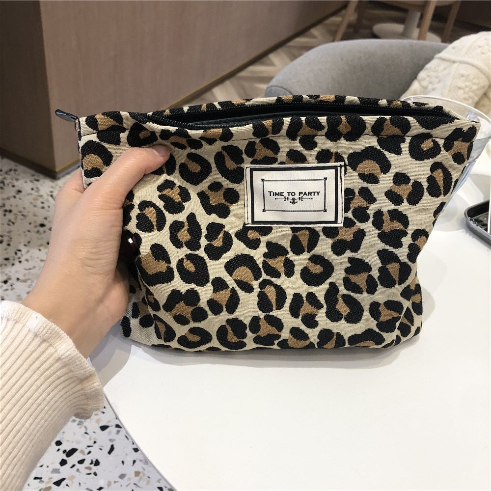 Necessär med leopard- och zebramönster
