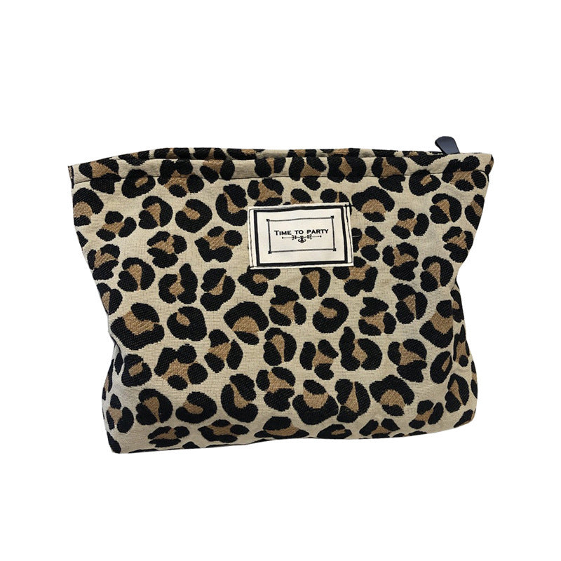 Necessär med leopard- och zebramönster